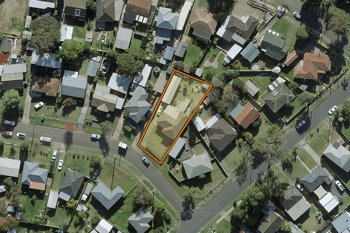 Aerial photo of 1 Shepherd Street, Lalor Park NSW 2147 with the lot boundary outlined in amber