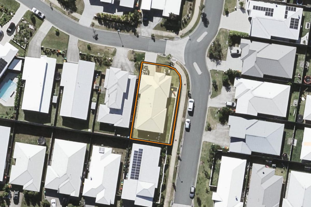 Aerial photo of 1 Wallum Street, Peregian Springs QLD 4573 with the lot boundary outlined in amber