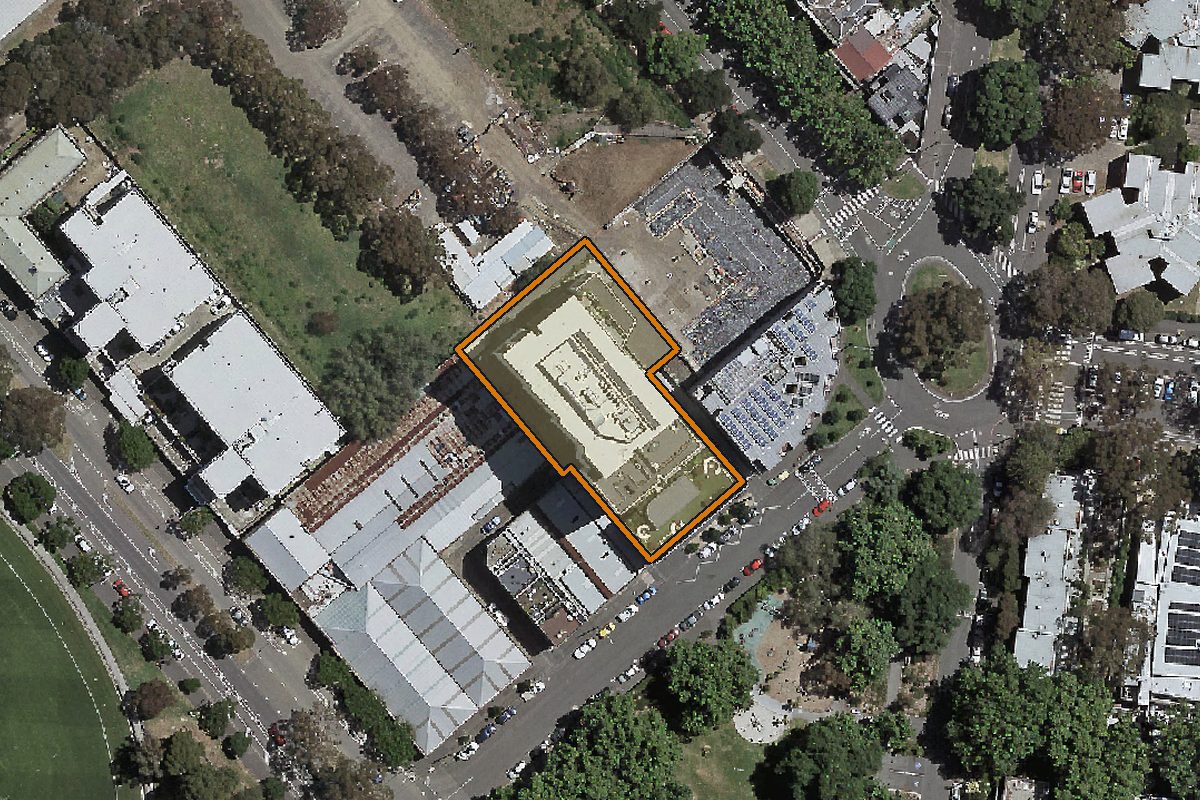 Aerial photo of 101/108 Haines Street, North Melbourne VIC 3051 with the lot boundary outlined in amber