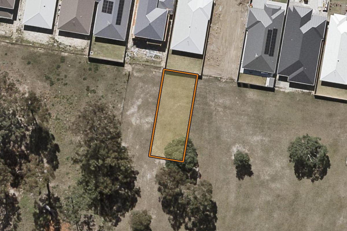 Aerial photo of 102 Barratt Drive, Greenbank QLD 4124 with the lot boundary outlined in amber