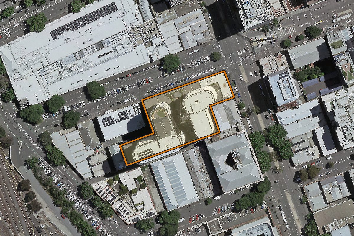 Aerial photo of 105 Batman Street, West Melbourne VIC 3003 with the lot boundary outlined in amber