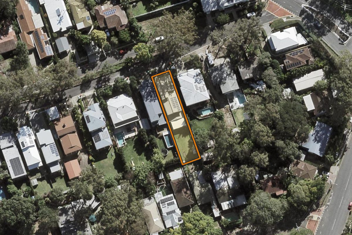 Aerial photo of 12 Henry Street, Chapel Hill QLD 4069 with the lot boundary outlined in amber