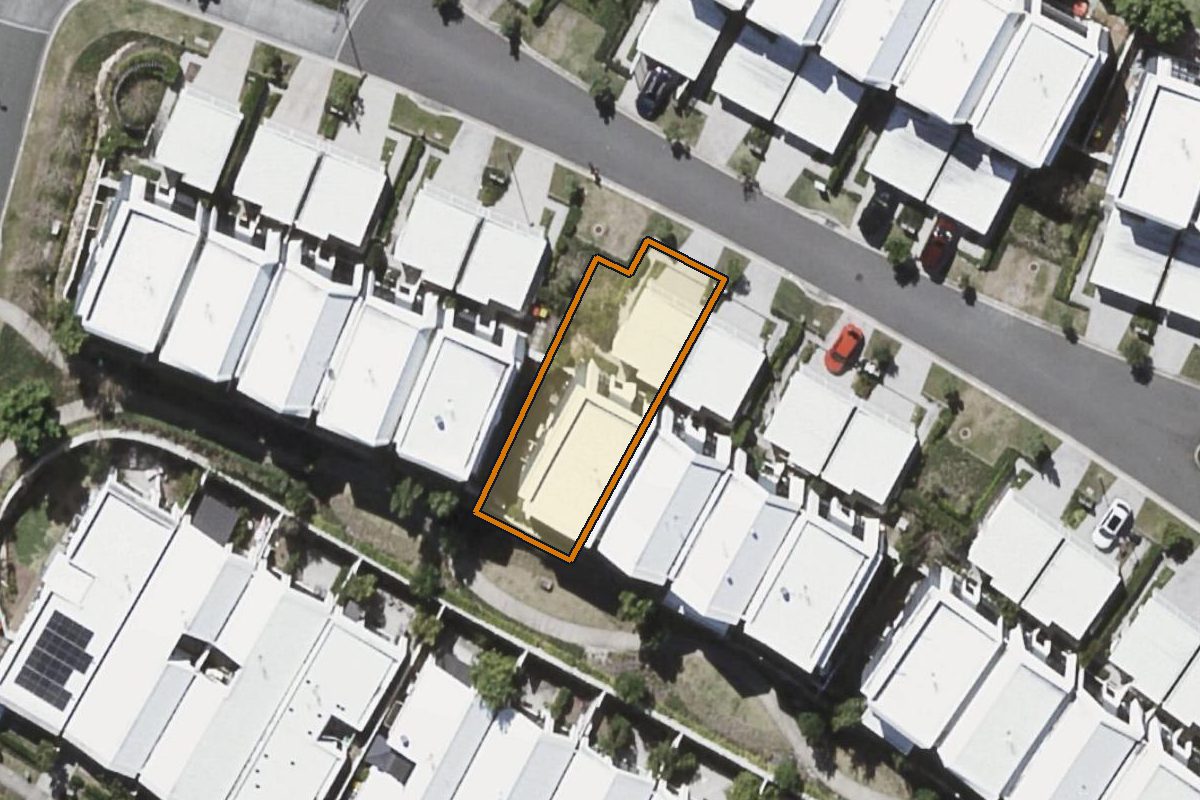 Aerial photo of 12 Terraces Court, Peregian Springs QLD 4573 with the lot boundary outlined in amber