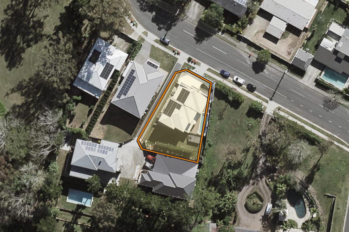 Aerial photo of 122 Sunset Road, Kenmore QLD 4069 with the lot boundary outlined in amber