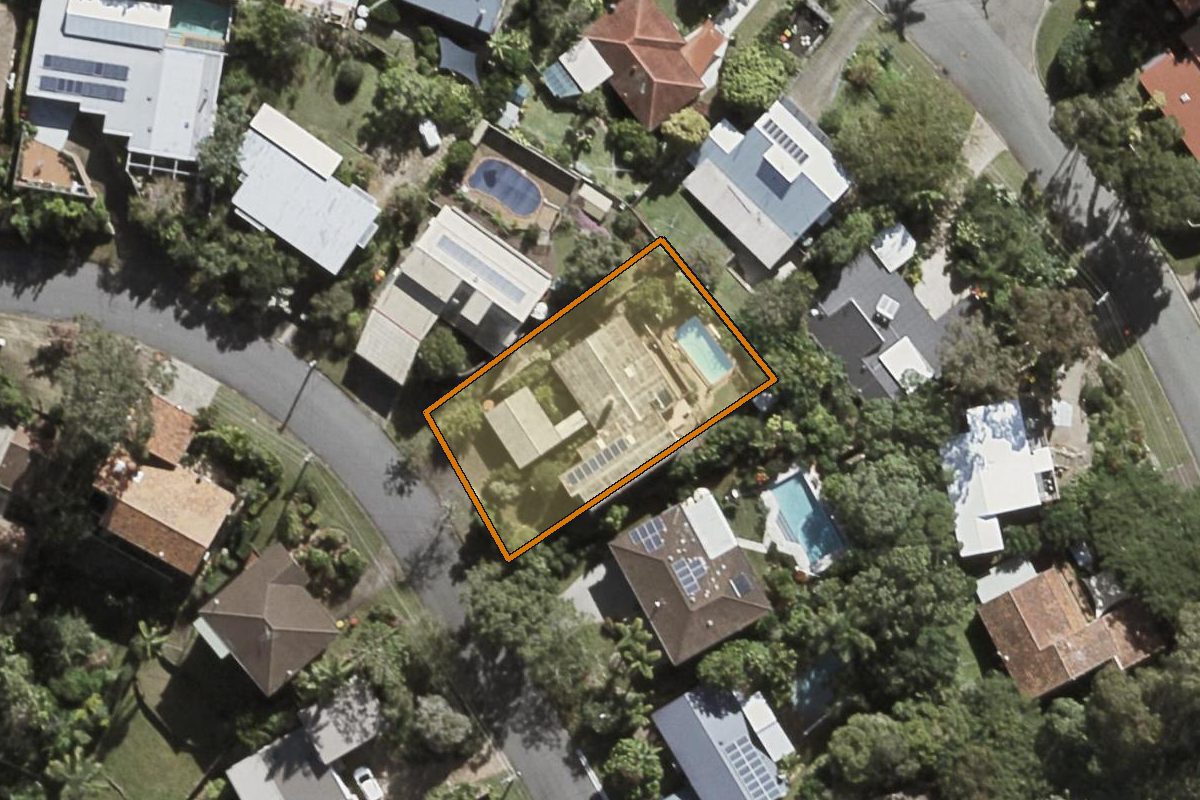 Aerial photo of 13 Alenola Street, Chapel Hill QLD 4069 with the lot boundary outlined in amber