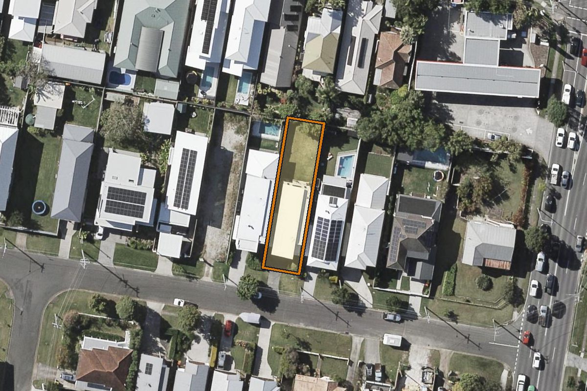 Aerial photo of 13 Lady Galway Street, Enoggera QLD 4051 with the lot boundary outlined in amber
