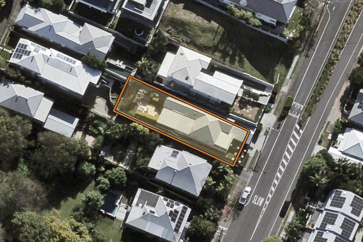 Aerial photo of 14 Cochrane Street, Paddington QLD 4064 with the lot boundary outlined in amber