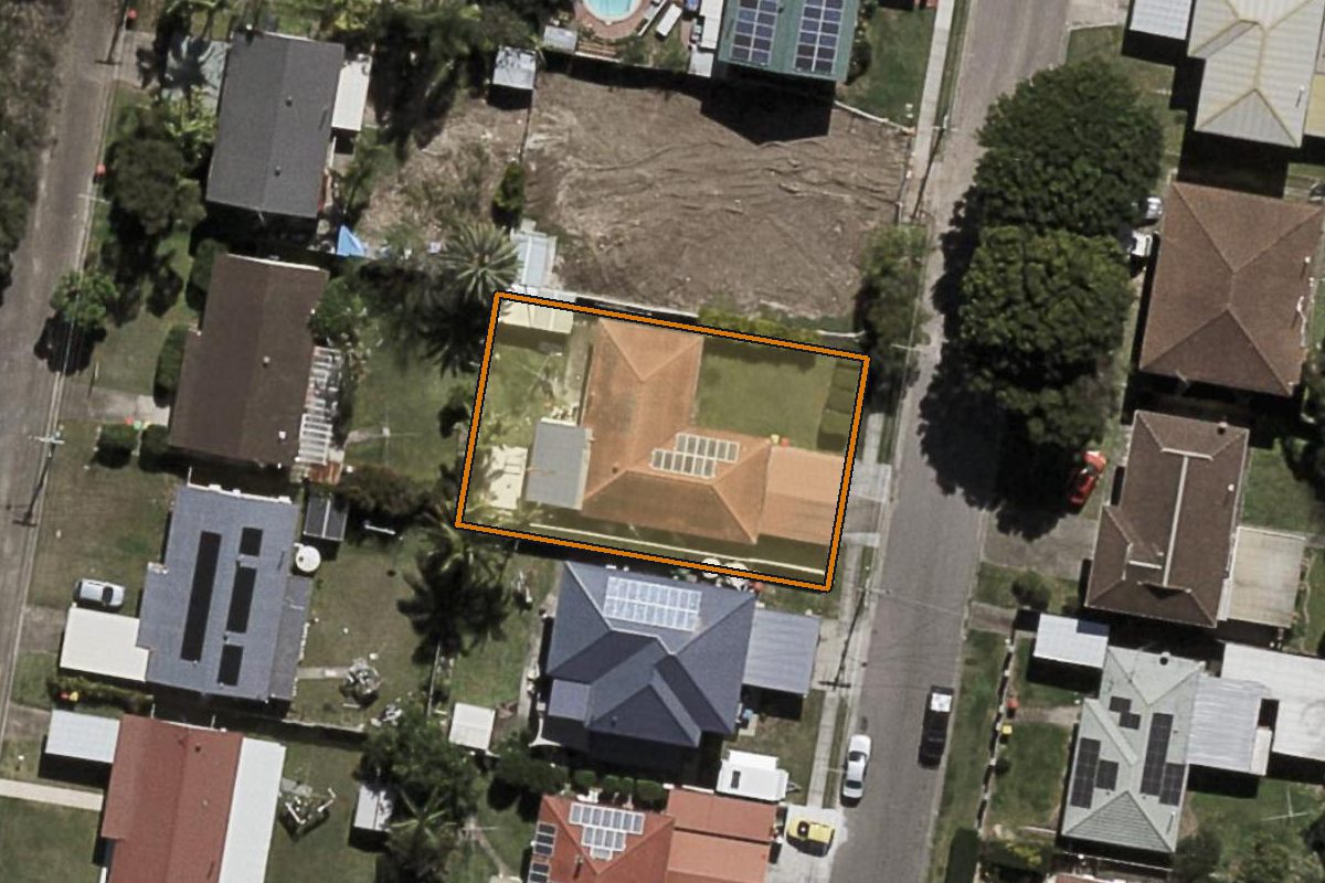 Aerial photo of 14 Phaius Street, Acacia Ridge QLD 4110 with the lot boundary outlined in amber