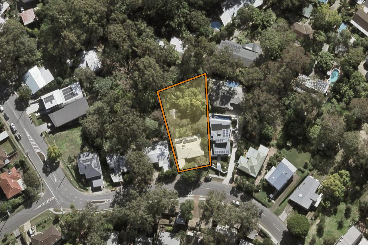 Aerial photo of 148 Jesmond Road, Indooroopilly QLD 4068 with the lot boundary outlined in amber