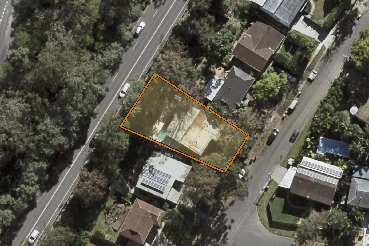 Aerial photo of 15 Fallbrook Street, Kenmore QLD 4069 with the lot boundary outlined in amber