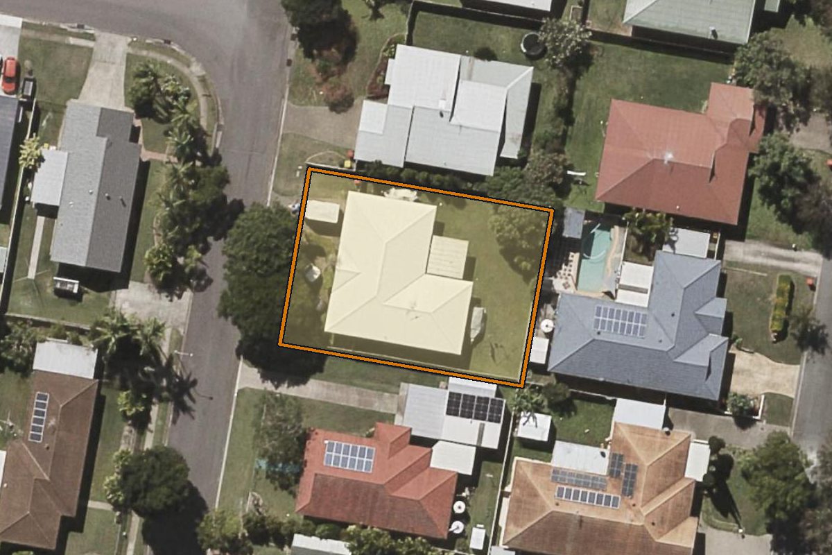 Aerial photo of 15 Rinnicrew Street, Bracken Ridge QLD 4017 with the lot boundary outlined in amber