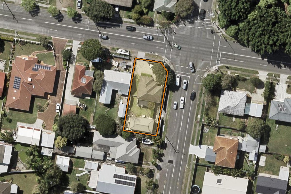Aerial photo of 150 Beams Road, Boondall QLD 4034 with the lot boundary outlined in amber