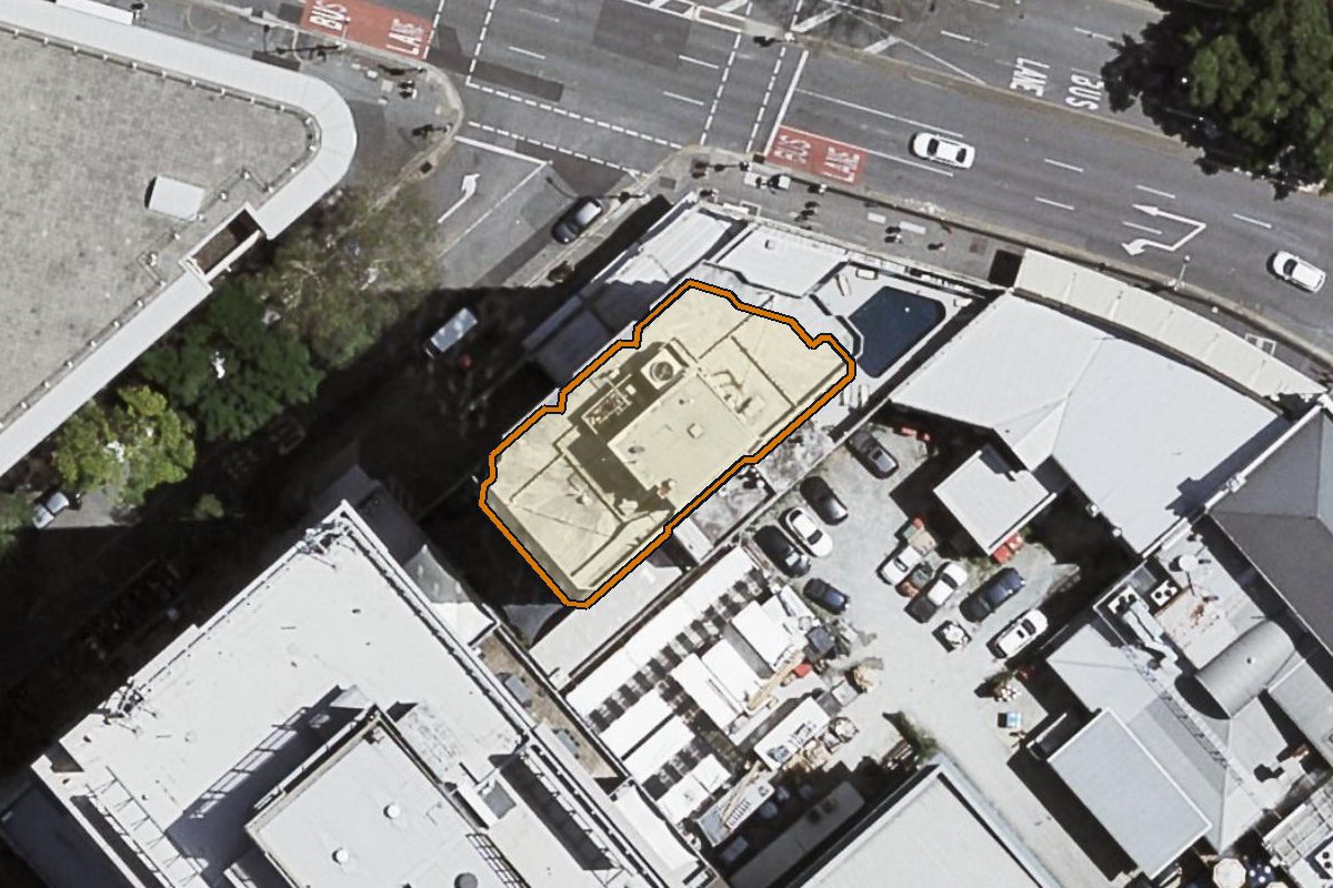 Aerial photo of 160 Roma Street, Brisbane City QLD 4000 with the lot boundary outlined in amber