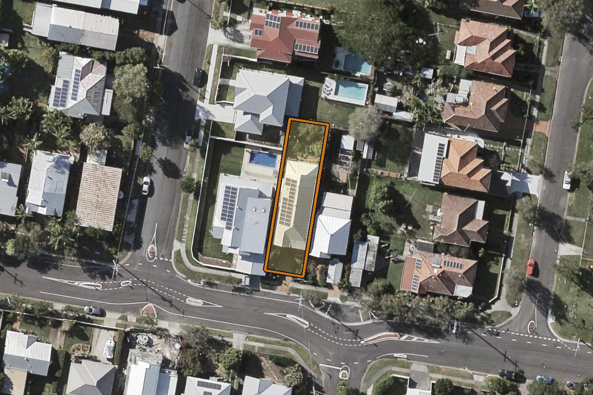 Aerial photo of 169 Lloyd Street, Enoggera QLD 4051 with the lot boundary outlined in amber