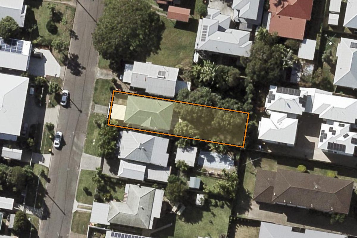 Aerial photo of 19 Charlie Street, Zillmere QLD 4034 with the lot boundary outlined in amber