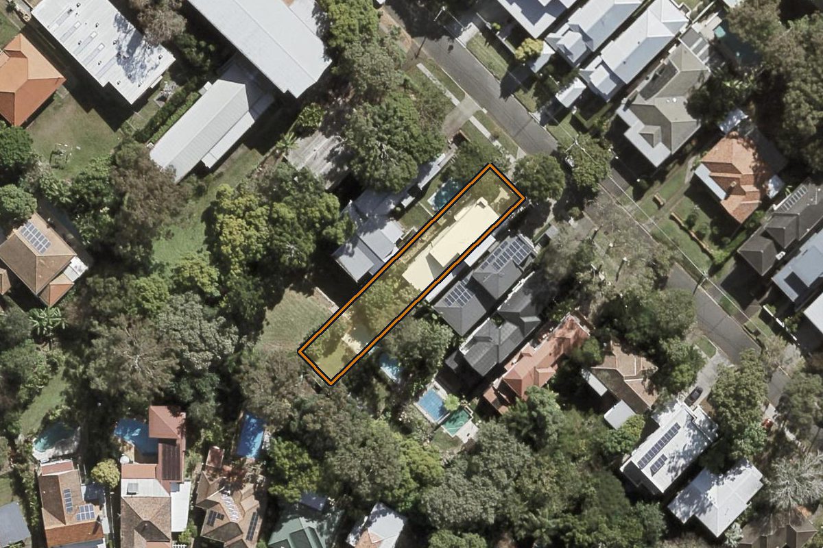 Aerial photo of 19 Ninth Avenue, St Lucia QLD 4067 with the lot boundary outlined in amber