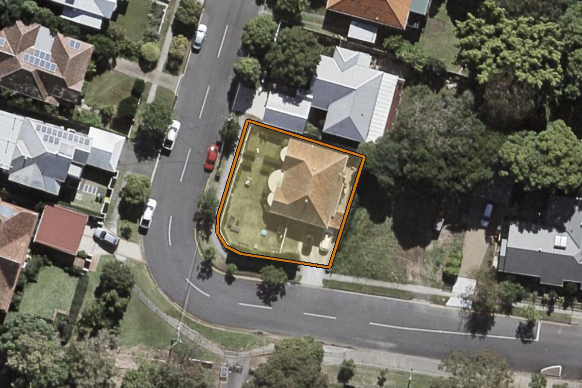 Aerial photo of 19 Otonga Road, Ashgrove QLD 4060 with the lot boundary outlined in amber