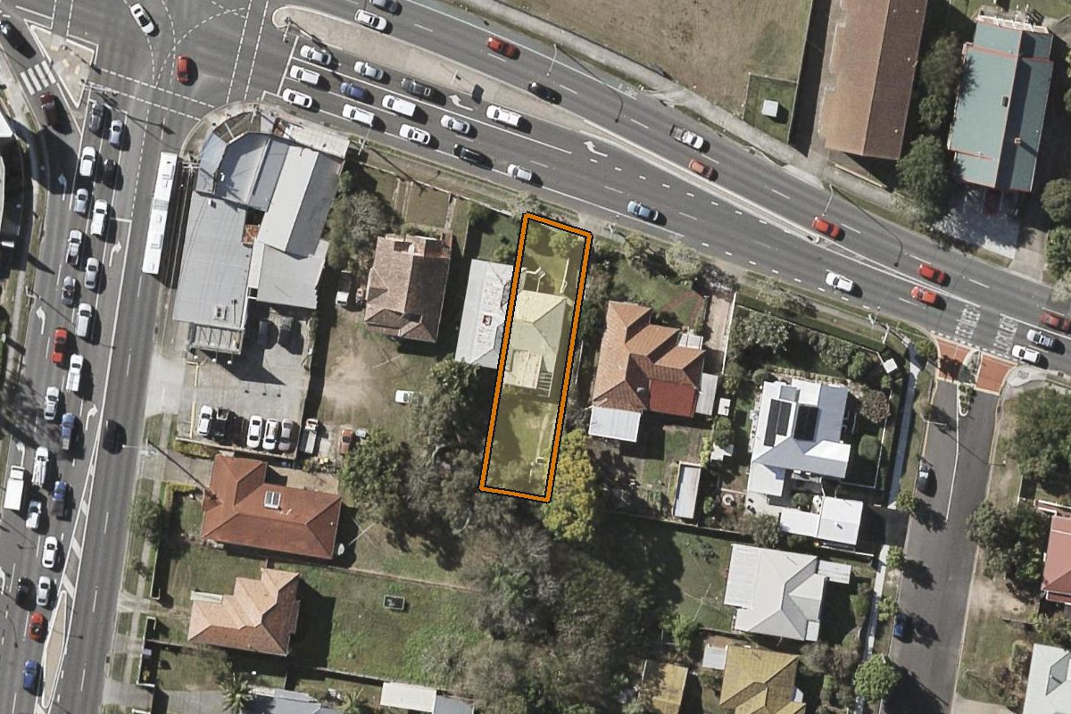Aerial photo of 194 Samford Road, Enoggera QLD 4051 with the lot boundary outlined in amber