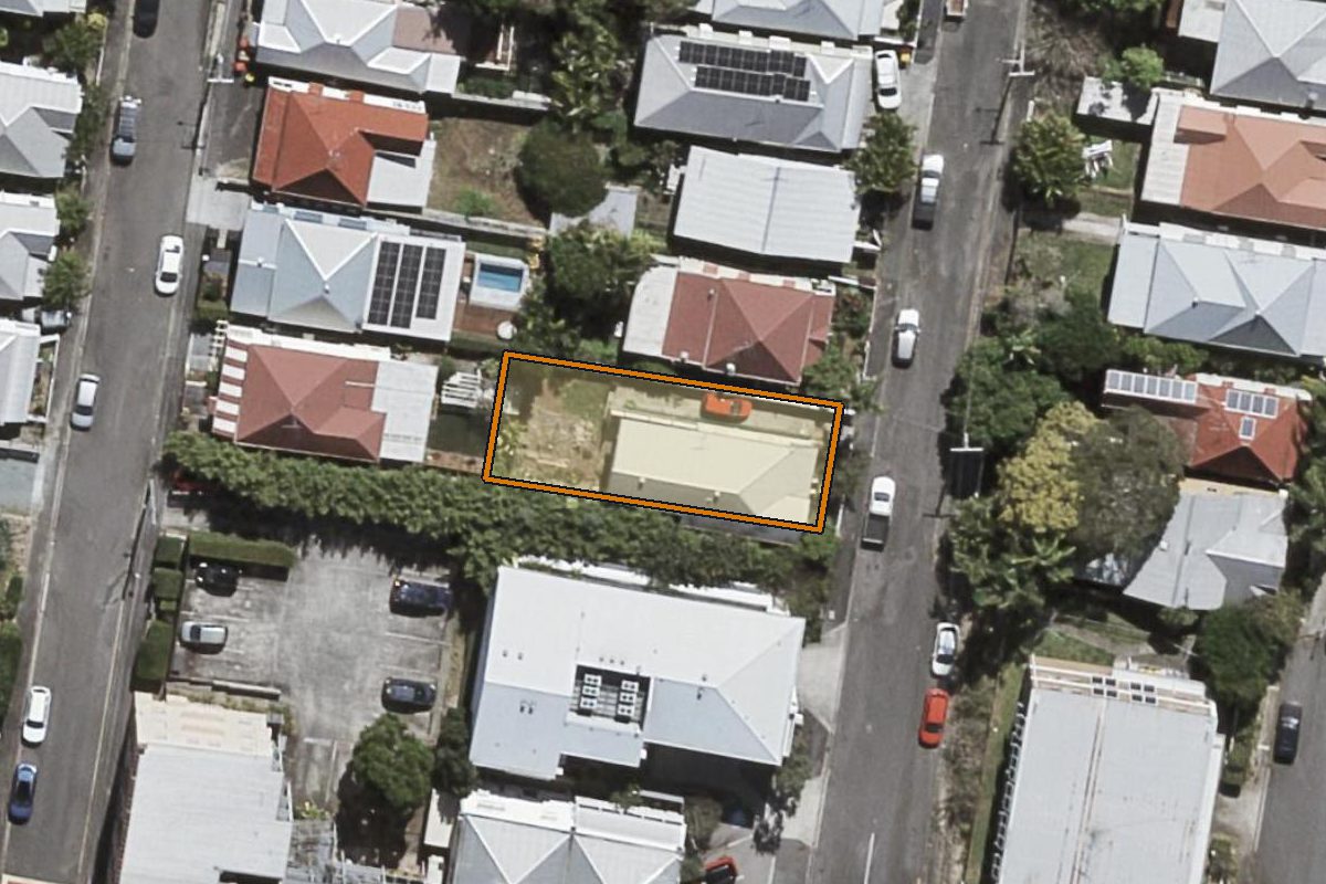 Aerial photo of 2 Federal Street, Red Hill QLD 4059 with the lot boundary outlined in amber