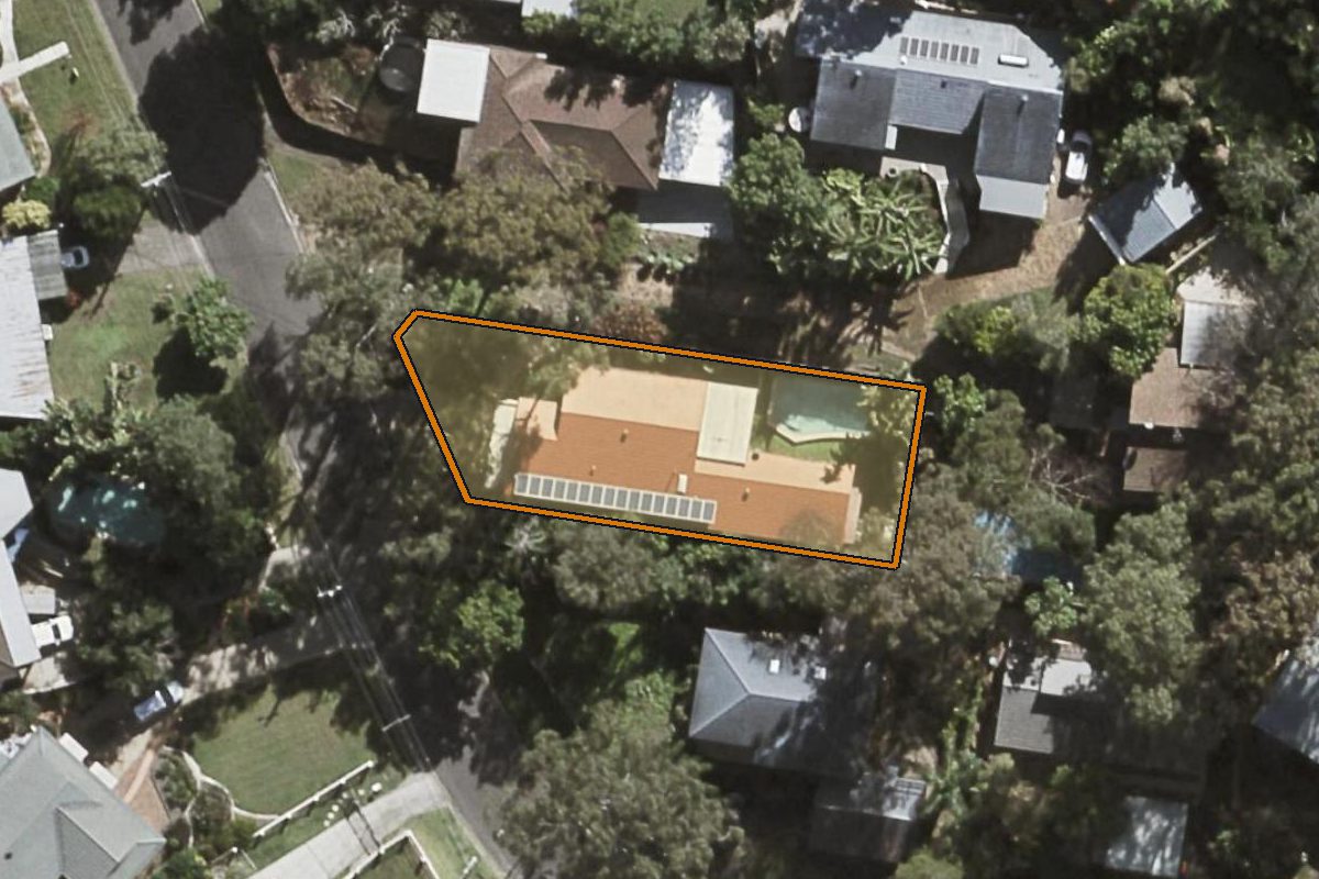 Aerial photo of 21 Tucker Street, Chapel Hill QLD 4069 with the lot boundary outlined in amber
