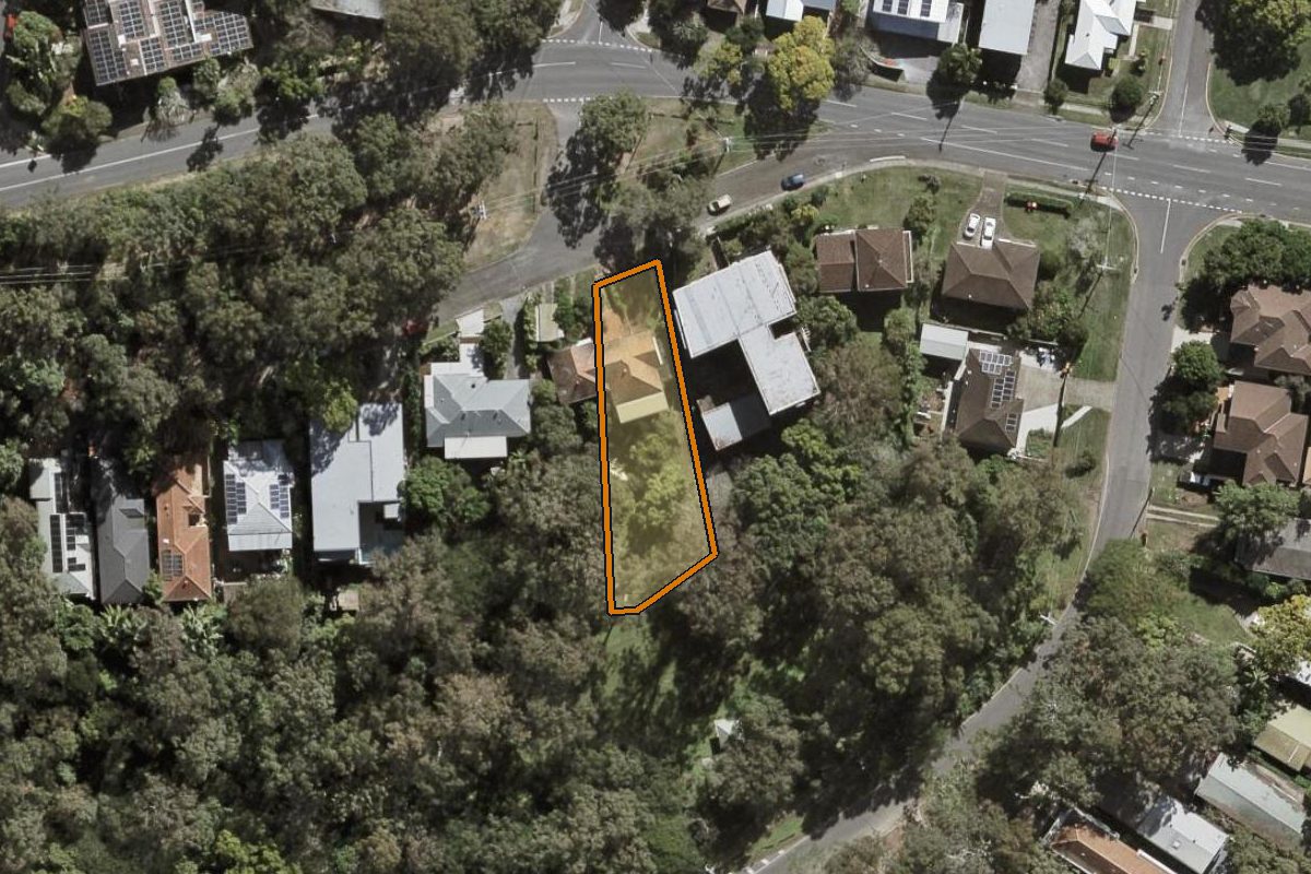 Aerial photo of 223 Carmody Road, St Lucia QLD 4067 with the lot boundary outlined in amber
