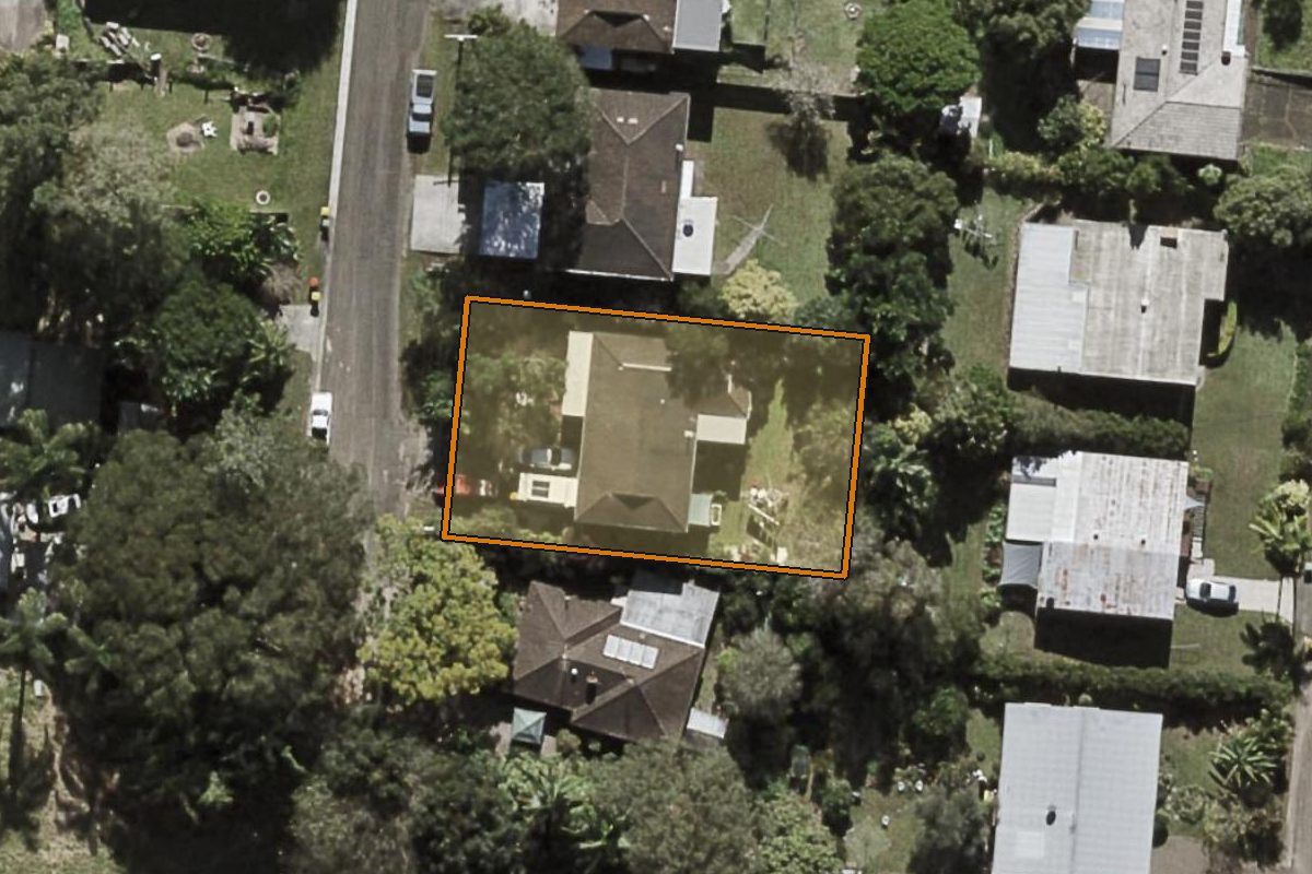 Aerial photo of 23 Baloo Street, Burnside QLD 4560 with the lot boundary outlined in amber