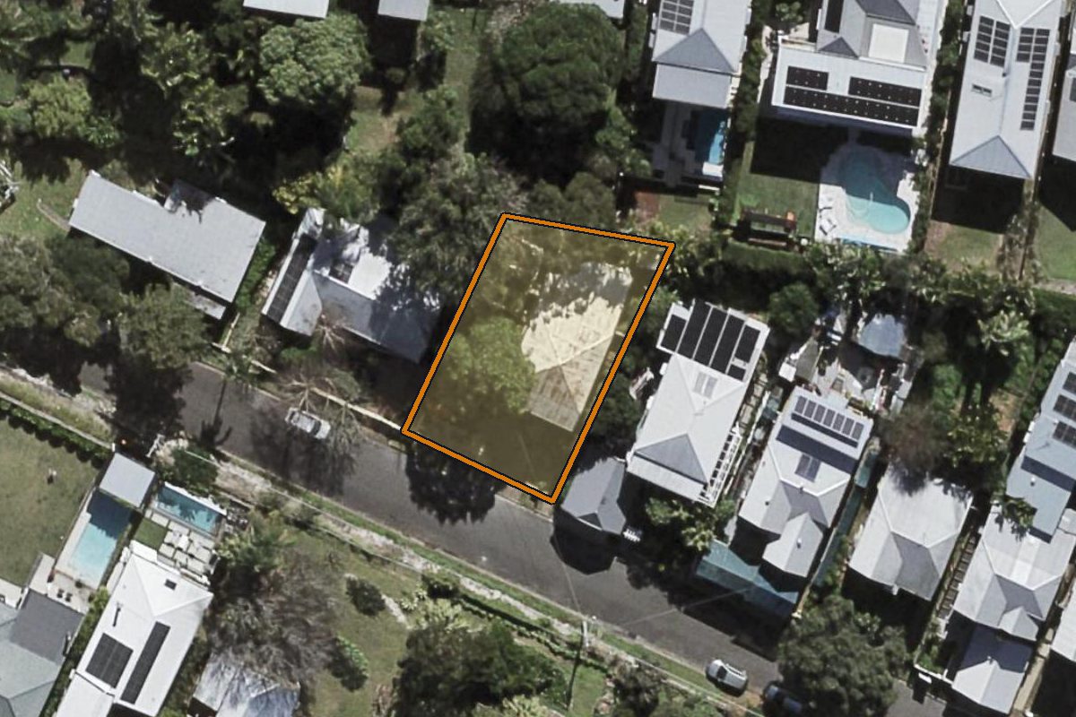 Aerial photo of 23 Devon Street, Red Hill QLD 4059 with the lot boundary outlined in amber