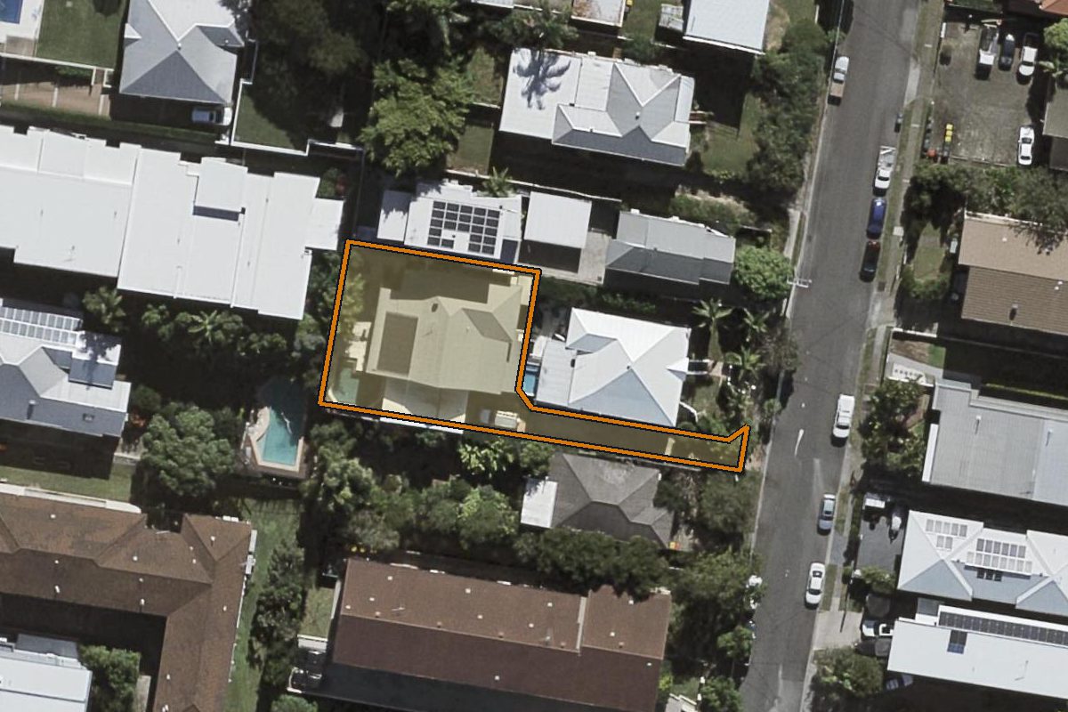 Aerial photo of 24 Pine Street, Bulimba QLD 4171 with the lot boundary outlined in amber