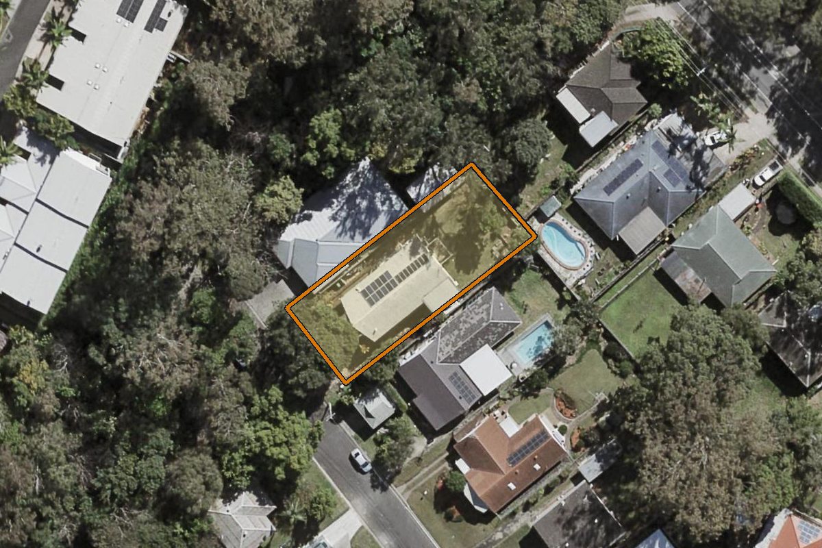 Aerial photo of 25 Belford Street, Kenmore QLD 4069 with the lot boundary outlined in amber