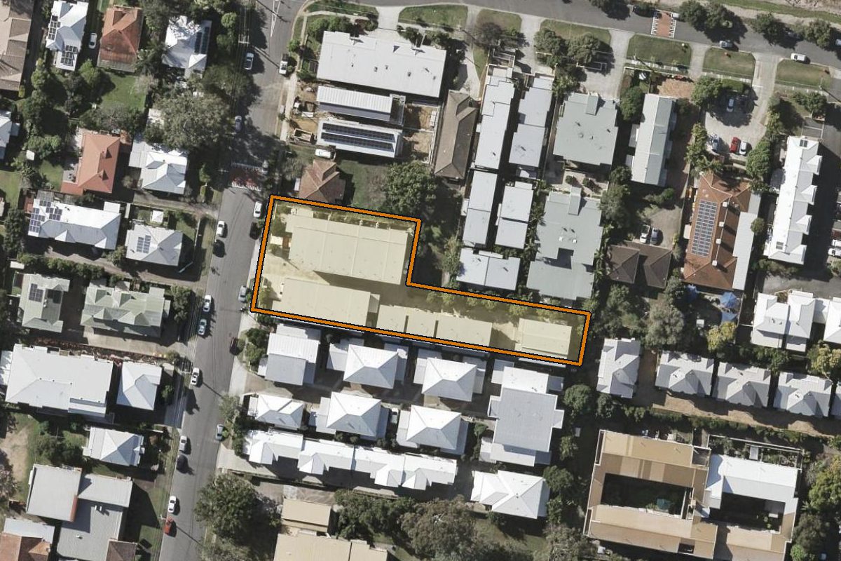 Aerial photo of 25 Hawthorne Street, Enoggera QLD 4051 with the lot boundary outlined in amber