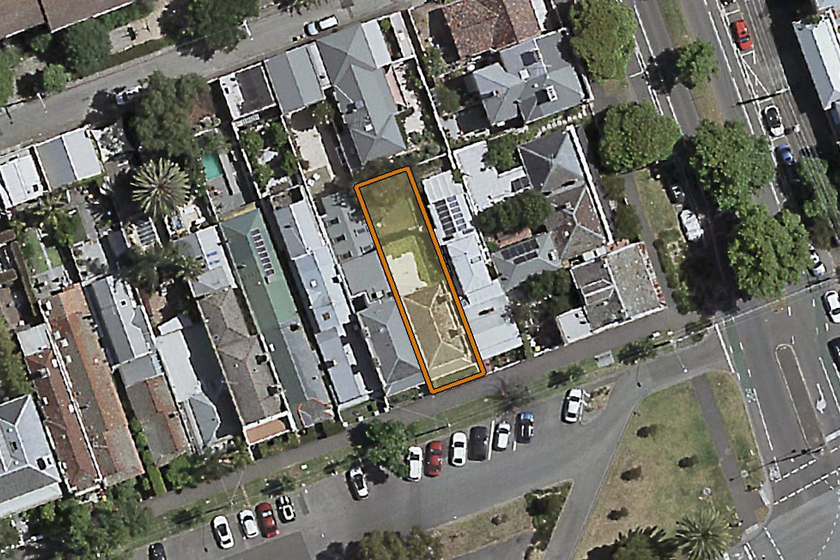 Aerial photo of 254 Albert Road, South Melbourne VIC 3205 with the lot boundary outlined in amber