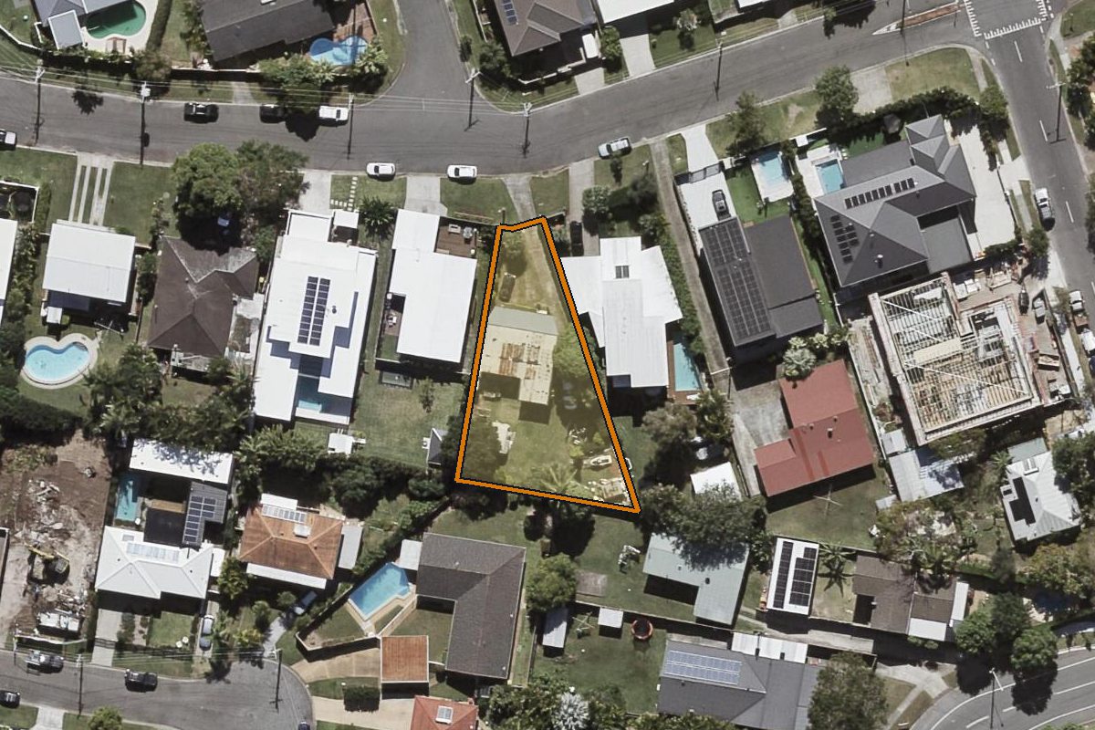 Aerial photo of 26 Banksia Broadway, Burleigh Heads QLD 4220 with the lot boundary outlined in amber