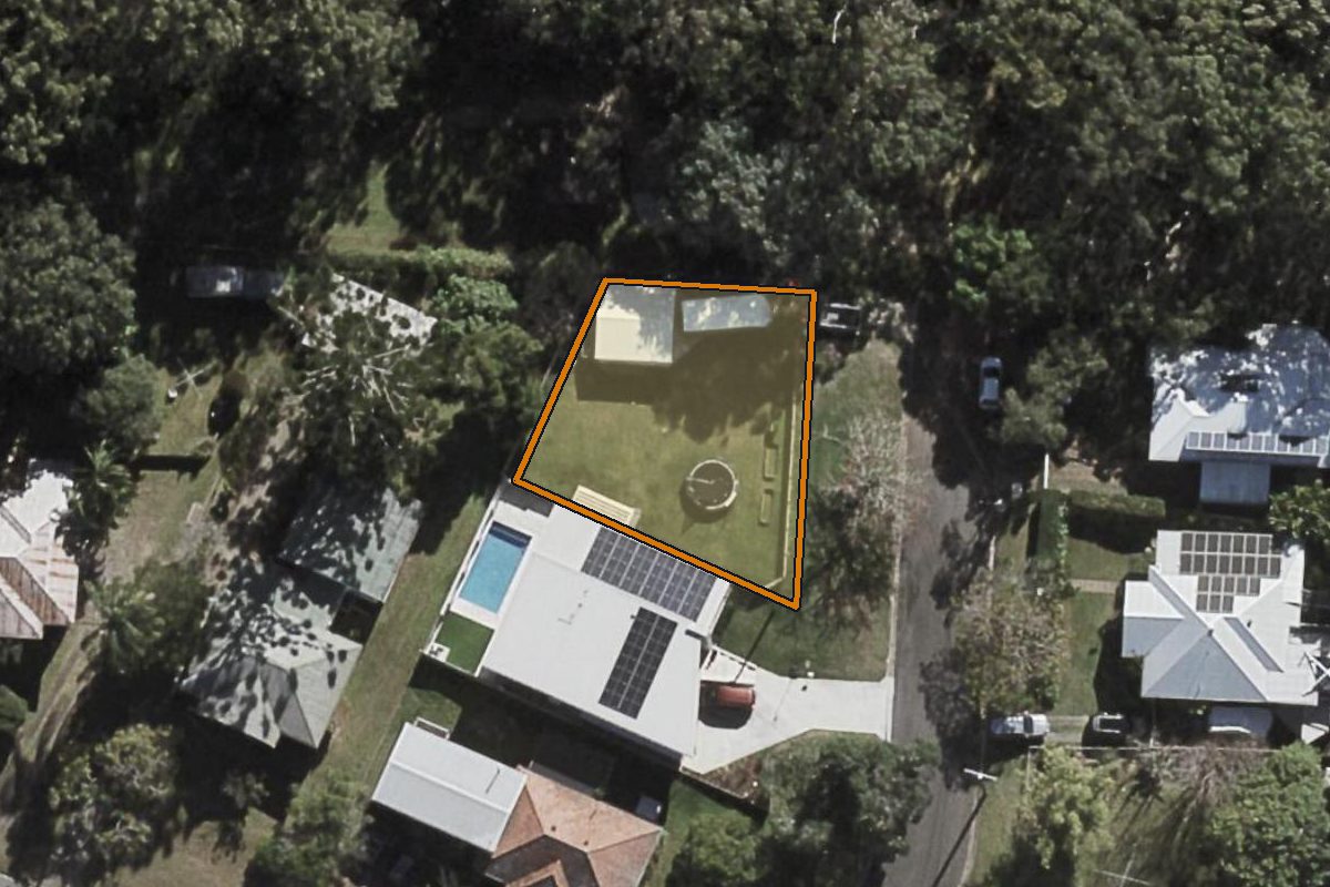 Aerial photo of 26 Topaz Street, Holland Park QLD 4121 with the lot boundary outlined in amber