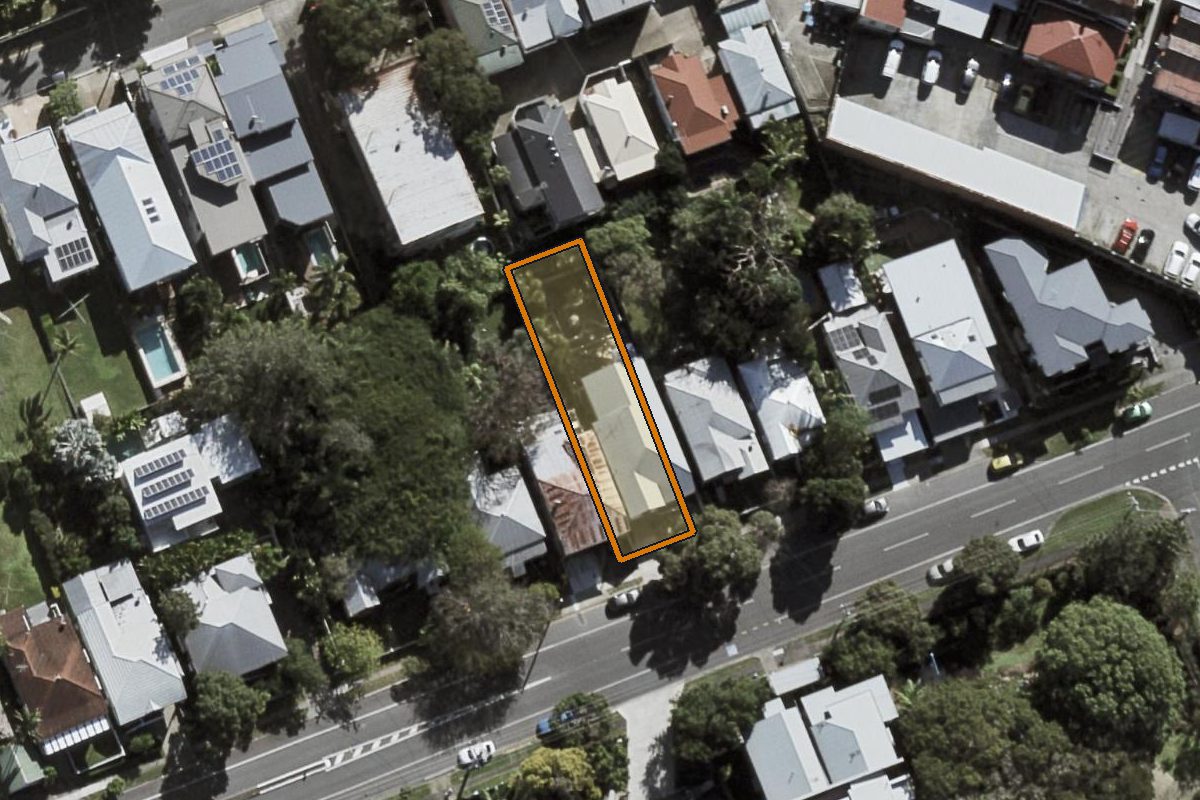 Aerial photo of 27 Guthrie Street, Paddington QLD 4064 with the lot boundary outlined in amber