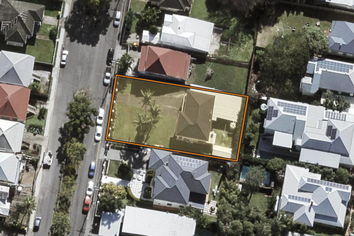 Aerial photo of 27 Morris Street, Paddington QLD 4064 with the lot boundary outlined in amber