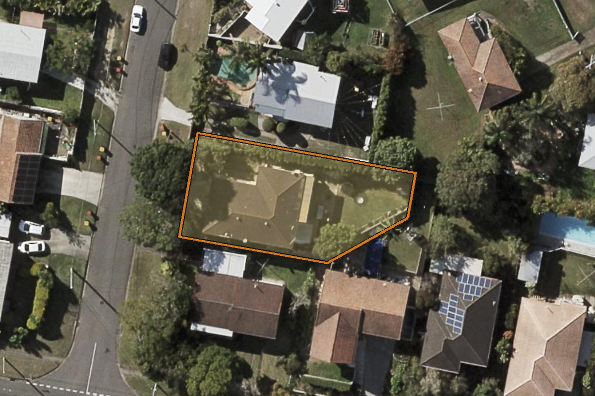 Aerial photo of 3 Winton Street, Stafford Heights QLD 4053 with the lot boundary outlined in amber