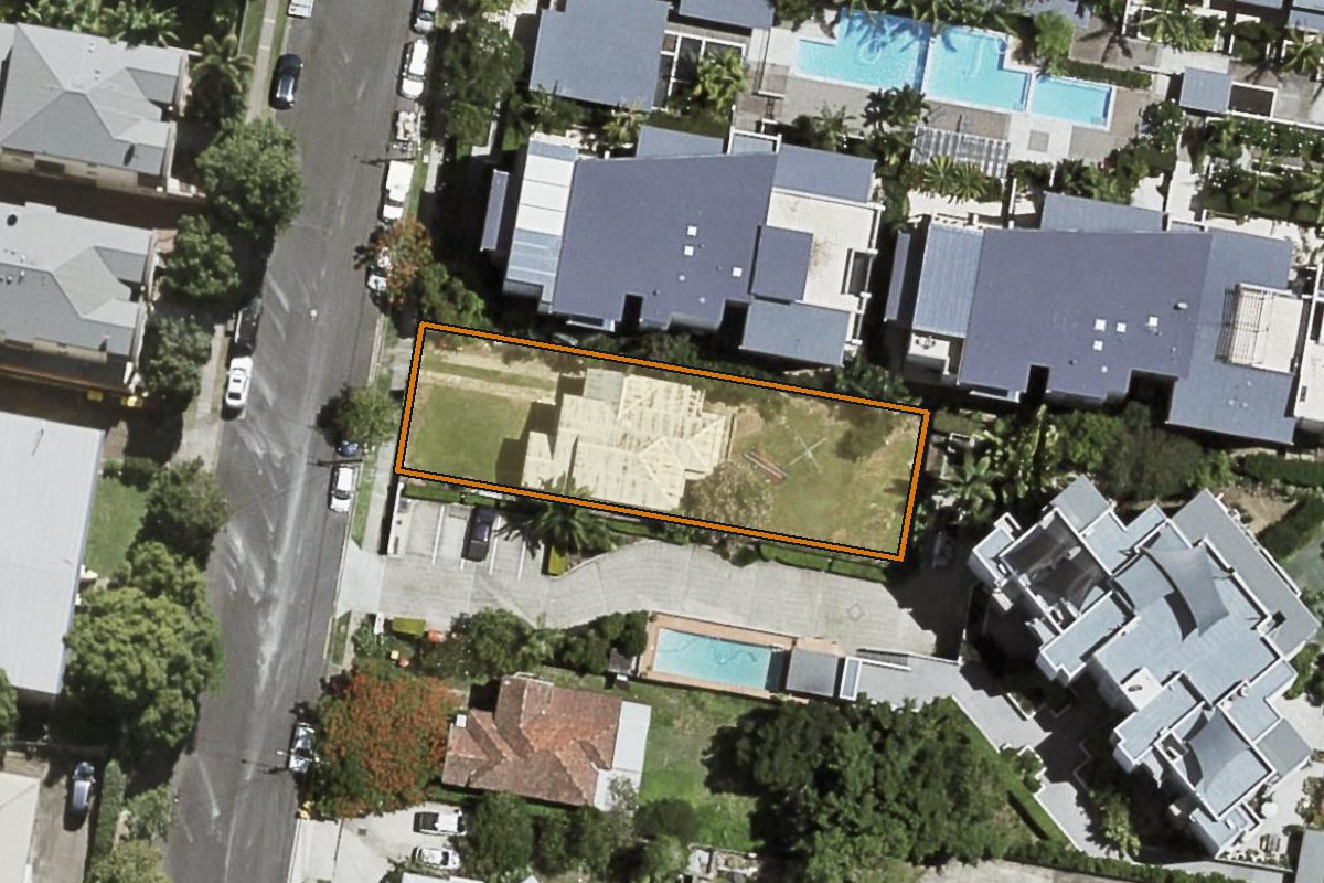 Aerial photo of 34 Holland Street, Toowong QLD 4066 with the lot boundary outlined in amber