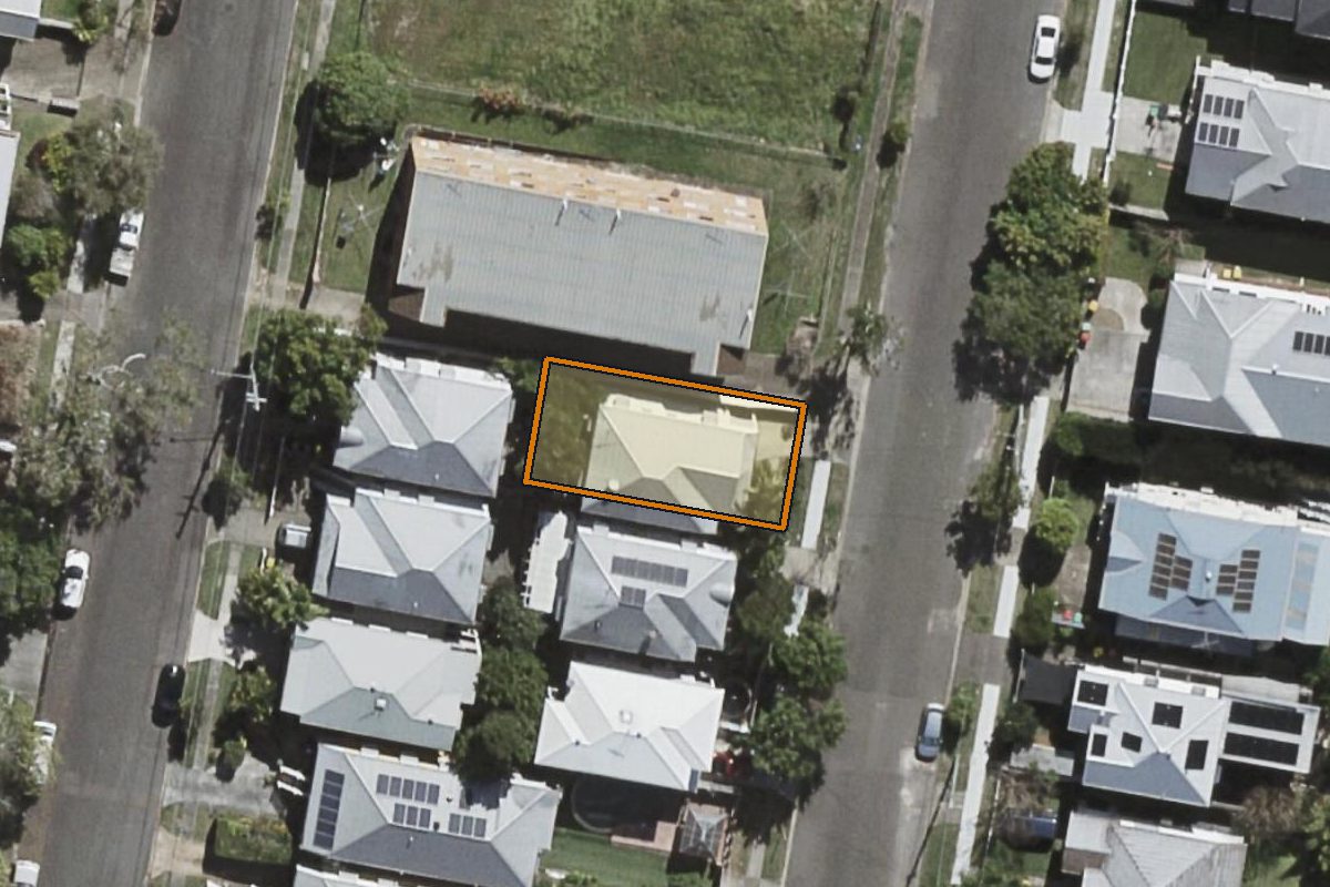 Aerial photo of 36 Ashfield Street, East Brisbane QLD 4169 with the lot boundary outlined in amber