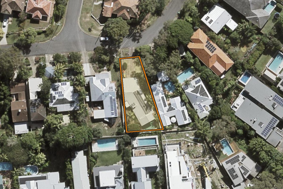Aerial photo of 38 Fifth Avenue, St Lucia QLD 4067 with the lot boundary outlined in amber