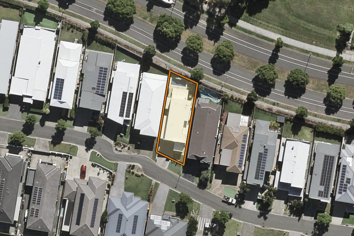 Aerial photo of 38 Phoenix Street, Rochedale QLD 4123 with the lot boundary outlined in amber