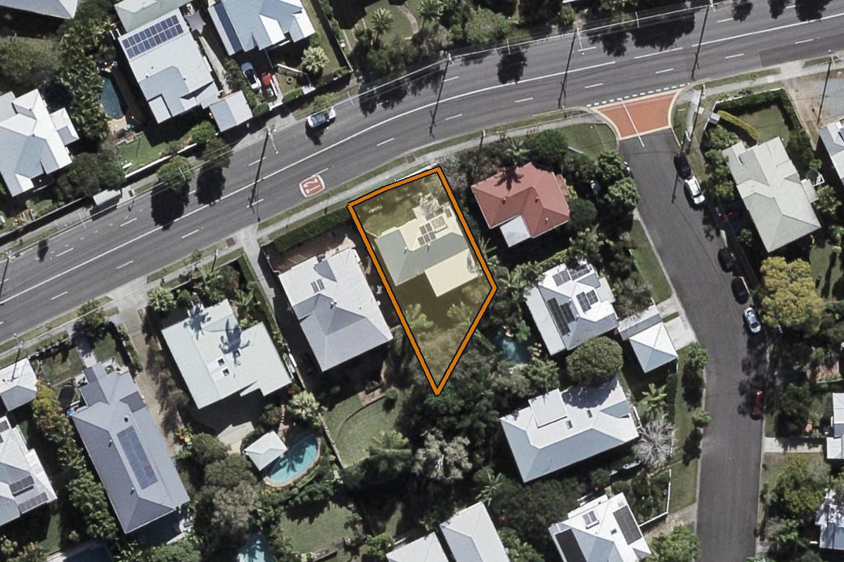 Aerial photo of 402 Waterworks Road, Ashgrove QLD 4060 with the lot boundary outlined in amber