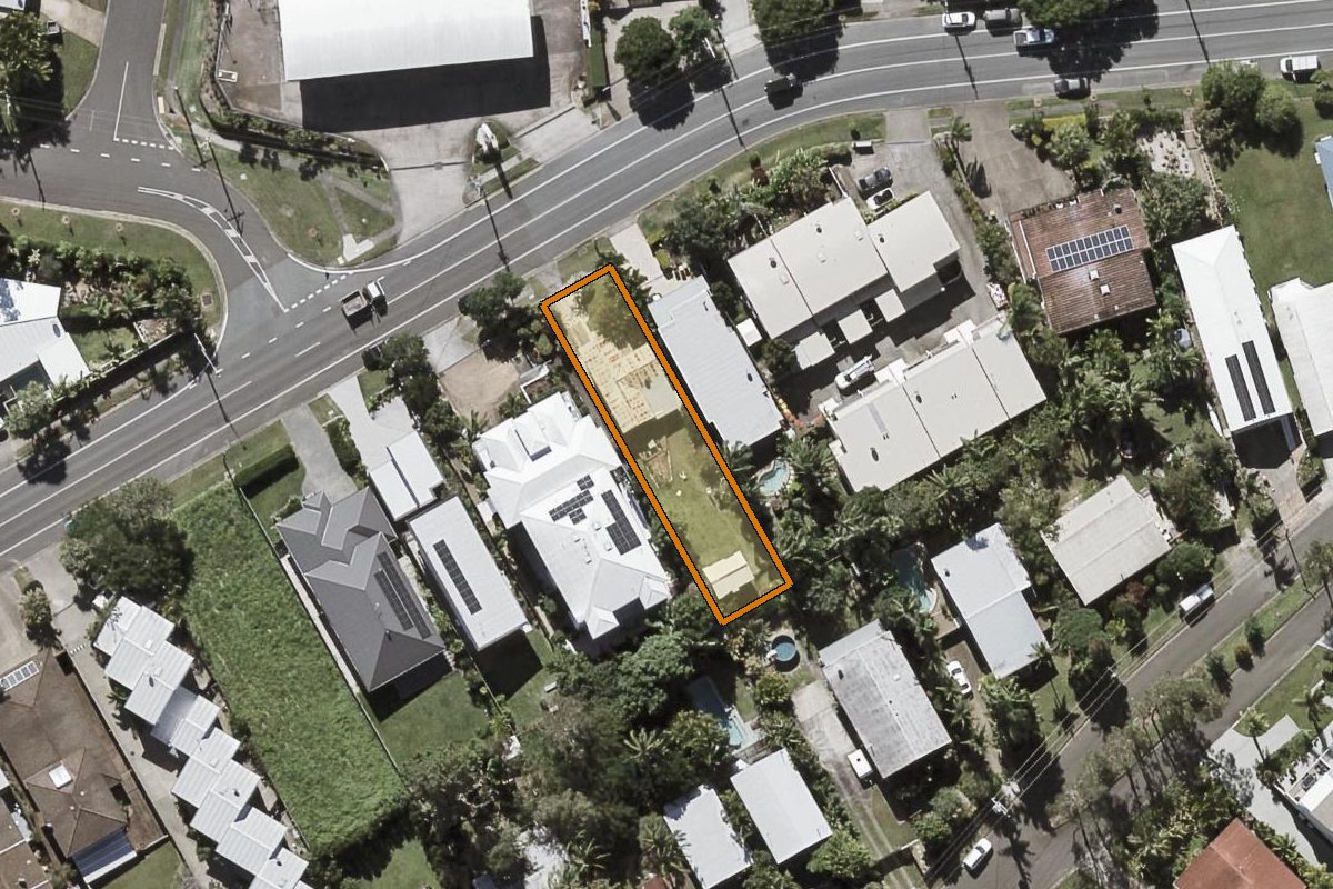 Aerial photo of 42 Yandina Coolum Road, Coolum Beach QLD 4573 with the lot boundary outlined in amber
