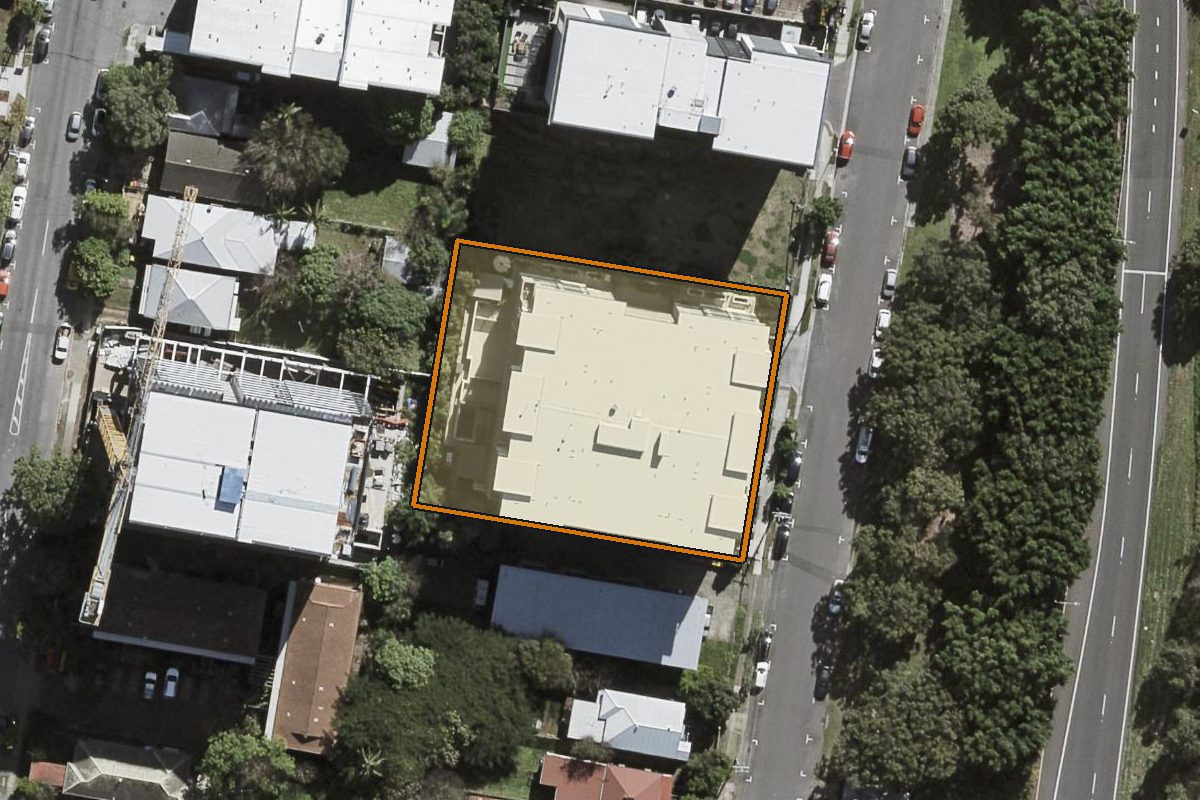 Aerial photo of 45-51 Regent Street, Woolloongabba QLD 4102 with the lot boundary outlined in amber