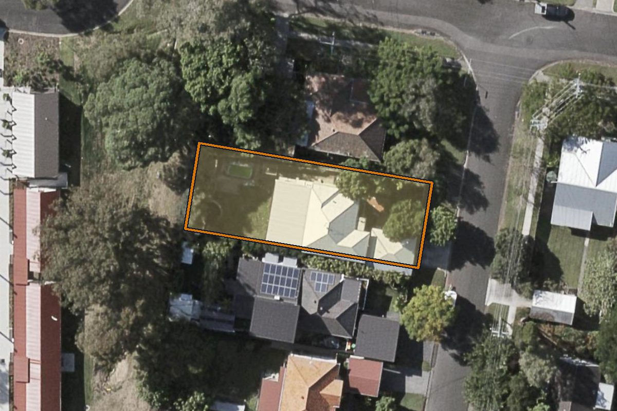 Aerial photo of 5 Mittagong Street, Enoggera QLD 4051 with the lot boundary outlined in amber