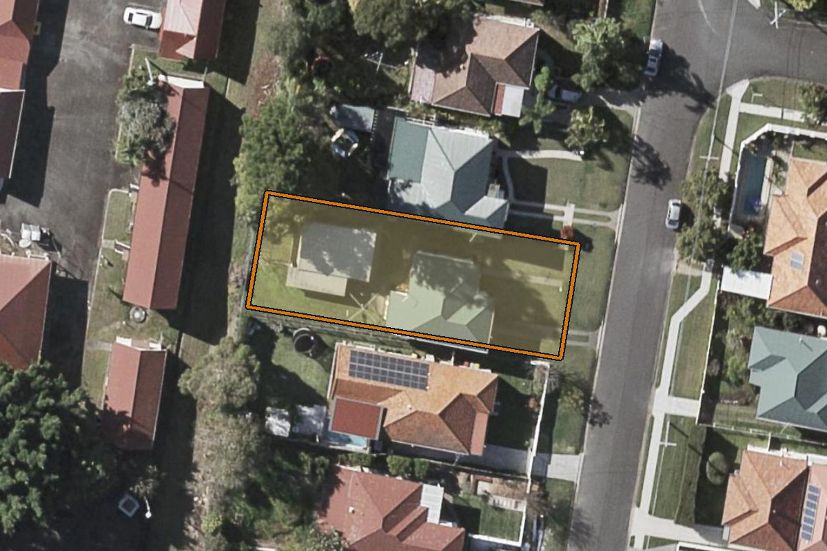 Aerial photo of 5 Ungalla Street, Enoggera QLD 4051 with the lot boundary outlined in amber