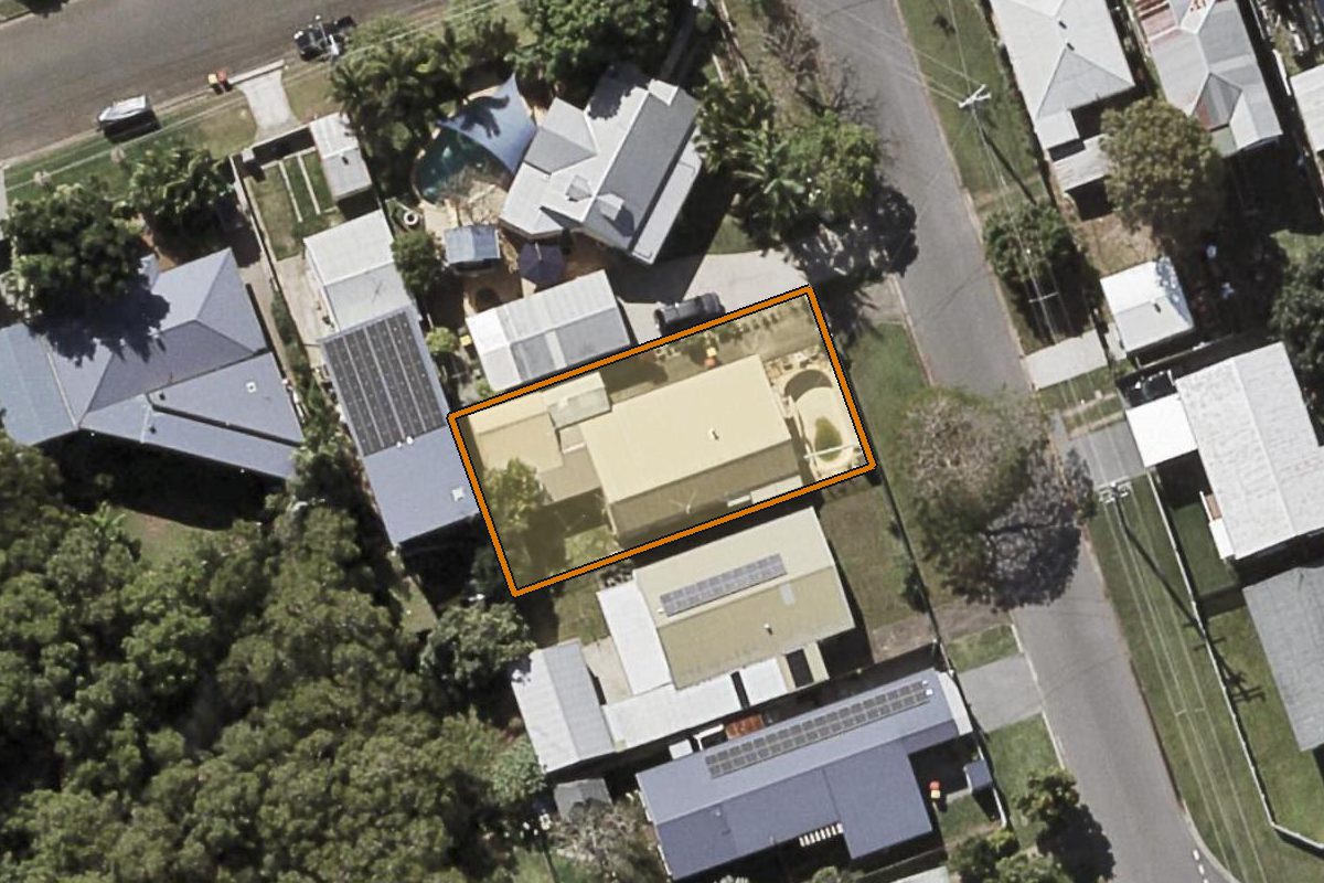 Aerial photo of 5 Utalong Street, Deagon QLD 4017 with the lot boundary outlined in amber