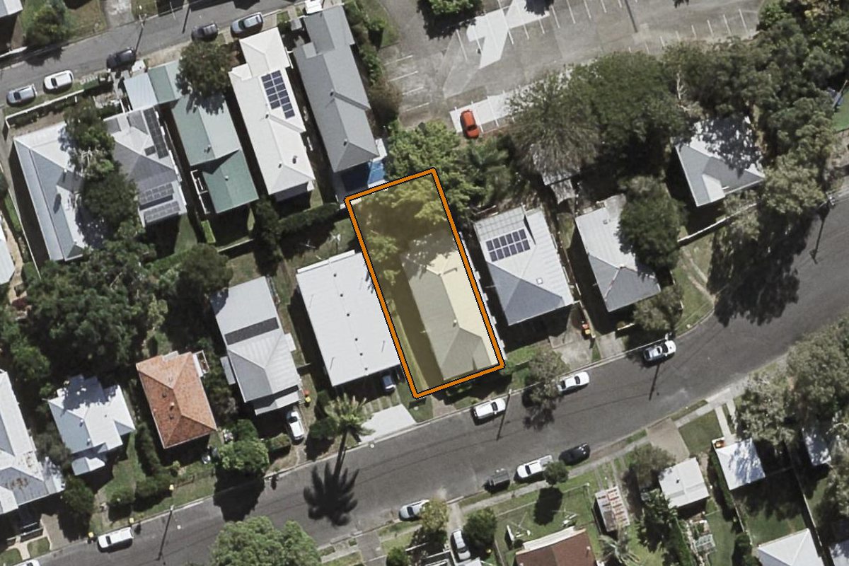 Aerial photo of 54 Gebbie Street, Kelvin Grove QLD 4059 with the lot boundary outlined in amber