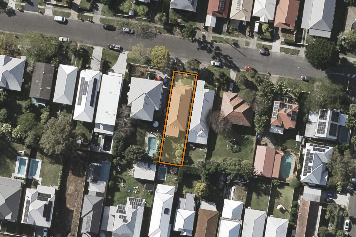 Aerial photo of 54 Orchid Street, Enoggera QLD 4051 with the lot boundary outlined in amber