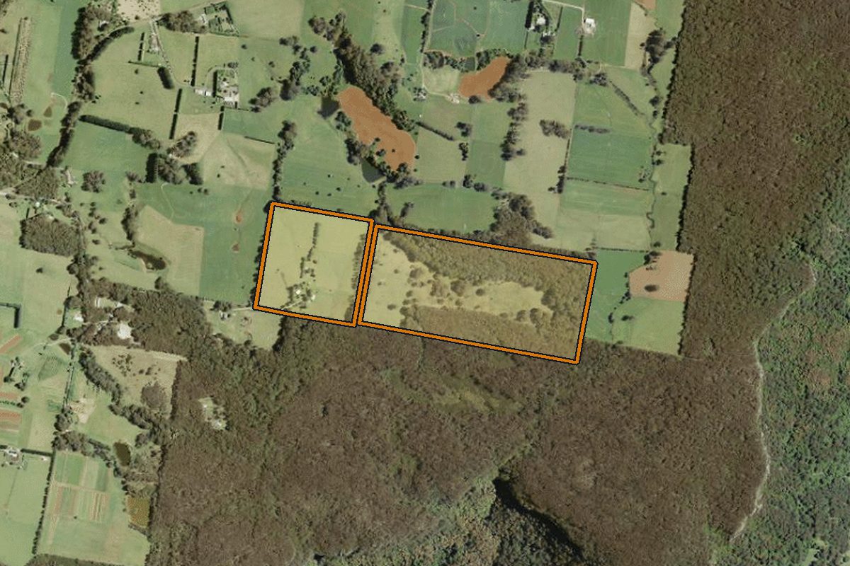 Aerial photo of 55 Yarrunga Road, Wildes Meadow NSW 2577 with the lot boundary outlined in amber