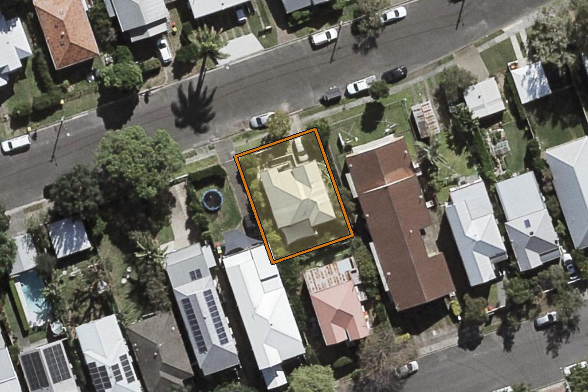 Aerial photo of 57 Gebbie Street, Kelvin Grove QLD 4059 with the lot boundary outlined in amber
